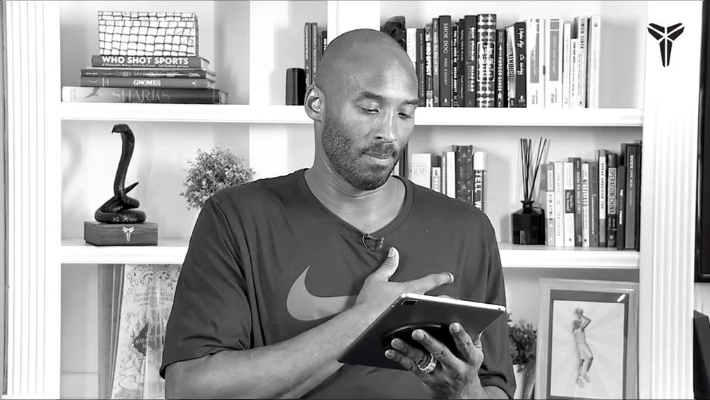  Kobe Bryant looking at tablet